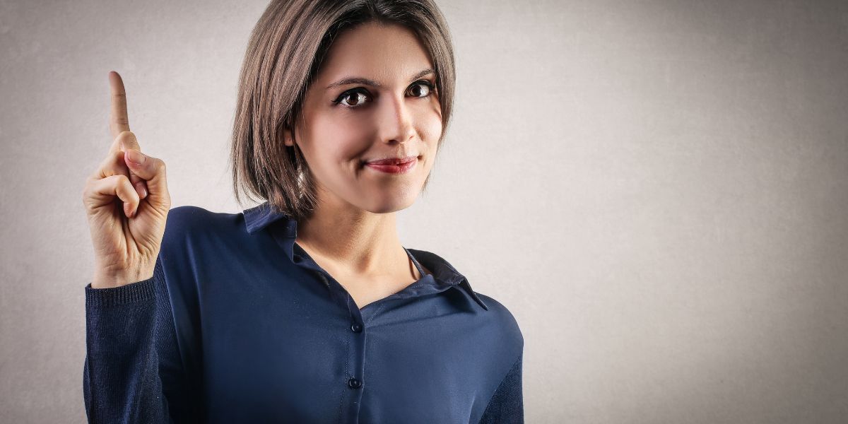 Woman pointing at important infomation